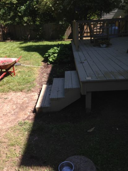 The old steps with the railing removed