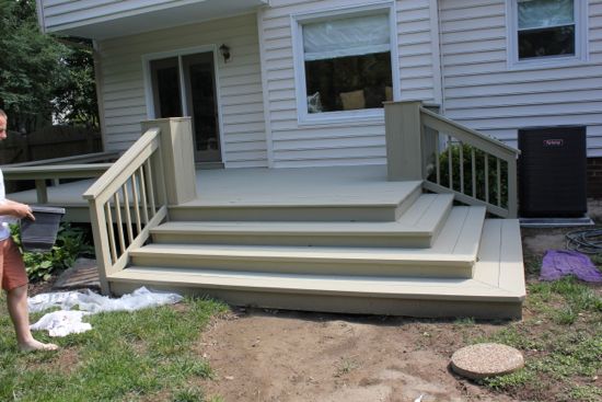 The stairs and deck painted with one coat of DeckOver